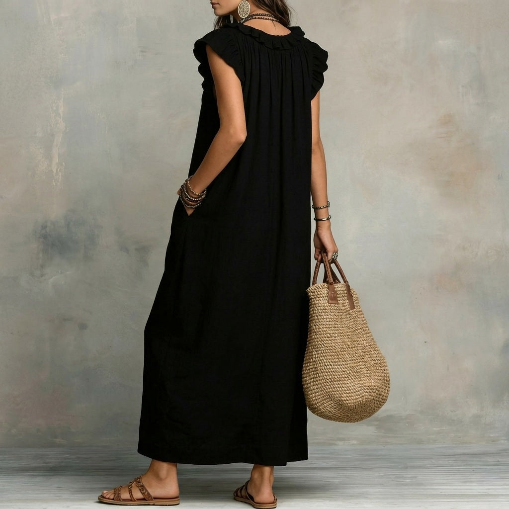 Inés | Vestido largo efecto lino con escote en pico y volantes