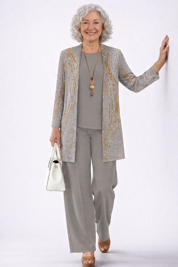 Almudena | Traje de invitada de tres piezas en gris y dorado